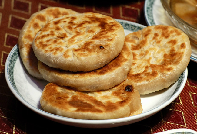 马烧麦原称马家烧麦,是沈阳市特殊风味的回民小吃,由马春创制于1796年